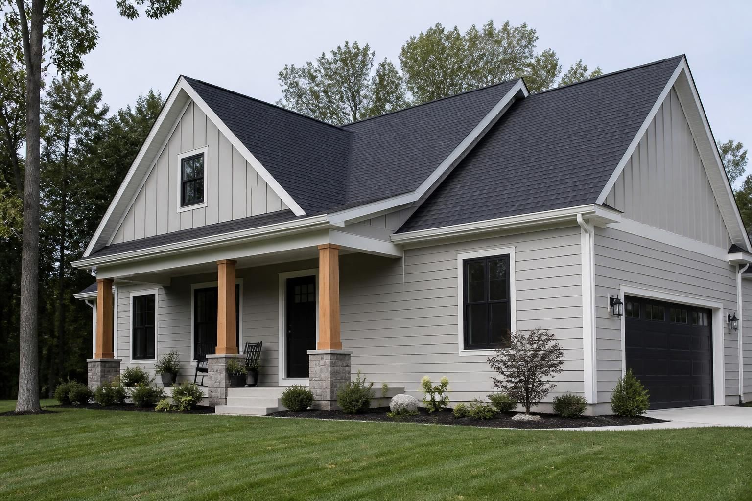 New roof and siding on a modern suburban home exterior.